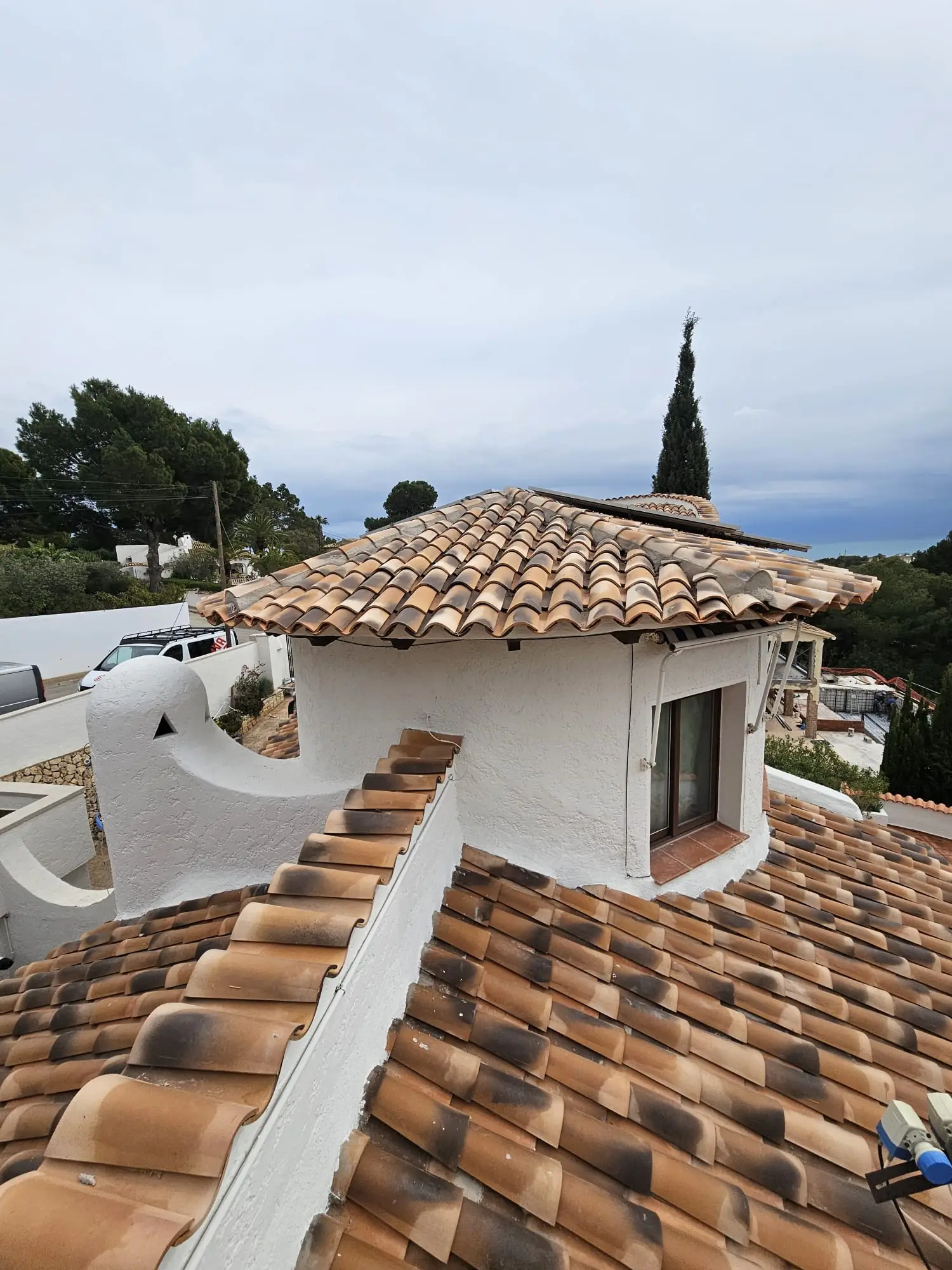 Roof repair and tile installation on a Mediterranean villa in Benidorm
